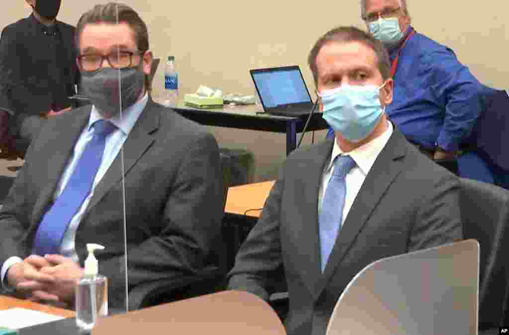 FILE - In this image from video, defense attorney Eric Nelson, left, and former Minneapolis police Officer Derek Chauvin are set for the verdict in Chauvin&#39;s trial for the 2020 death of George Floyd.