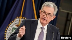 제롬 파월 연방준비제도(FED) 의장이 11일 기자회견을 열고 기준금리 동결을 발표하고 있다. 