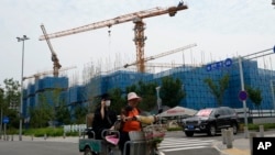 中国长期依赖房地产带动的增长模式。（美联社资料图）