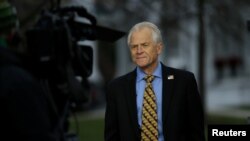FILE - White House trade adviser Peter Navarro is interviewed outside of the White House in Washington, Dec. 4, 2018. 