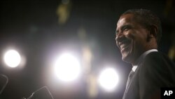 U.S.President Barack Obama talks about the economy at the SUNY-Albany Nano-Fab Extension Building in Albany, New York, May 8, 2012. 