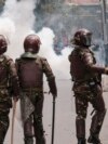 Kenya police officers are seen during an anti-government demonstration over tax hikes and a controversial now-withdrawn tax bill in downtown Nairobi, on July 2, 2024.