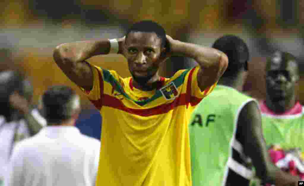 Mali's Seydou Keita reacts after their final African Cup of Nations Group D soccer match against Botswana at the Stade De L'Amitie Stadium in Libreville February 1, 2012.