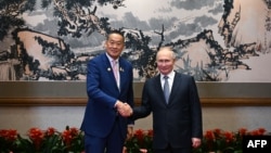 FILE - Russia's President Vladimir Putin meets with Thailand's Prime Minister Srettha Thavisin on the sidelines of the Third Belt and Road Forum in Beijing, Oct. 17, 2023.