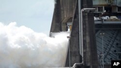 An AR-22 rocket engine is test fired at the NASA Stennis Space Center in Stennis, Miss., July 2, 2018. The AR-22 engine is designed to power an experimental spacecraft. 