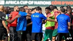 FILE - DR Congo's defender #22 Chancel Mbemba (CR) argues with Morocco's staff during the Africa Cup of Nations (CAN) 2024 group F football match between Morocco and DR Congo at Stade Laurent Pokou in San Pedro on January 21, 2024.