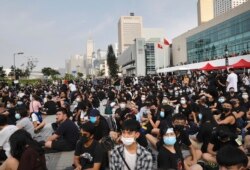 Students and others gather during a demonstration at Edinburgh Place in Hong Kong, Aug. 22, 2019.