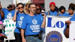 United Auto Workers union members march in the Labor Day Parade in Detroit, Michigan, Sept. 2, 2019.