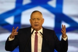 Blue and White party leader Benny Gantz addresses his supporters during election campaign rally in Tel Aviv, Feb. 29, 2020.