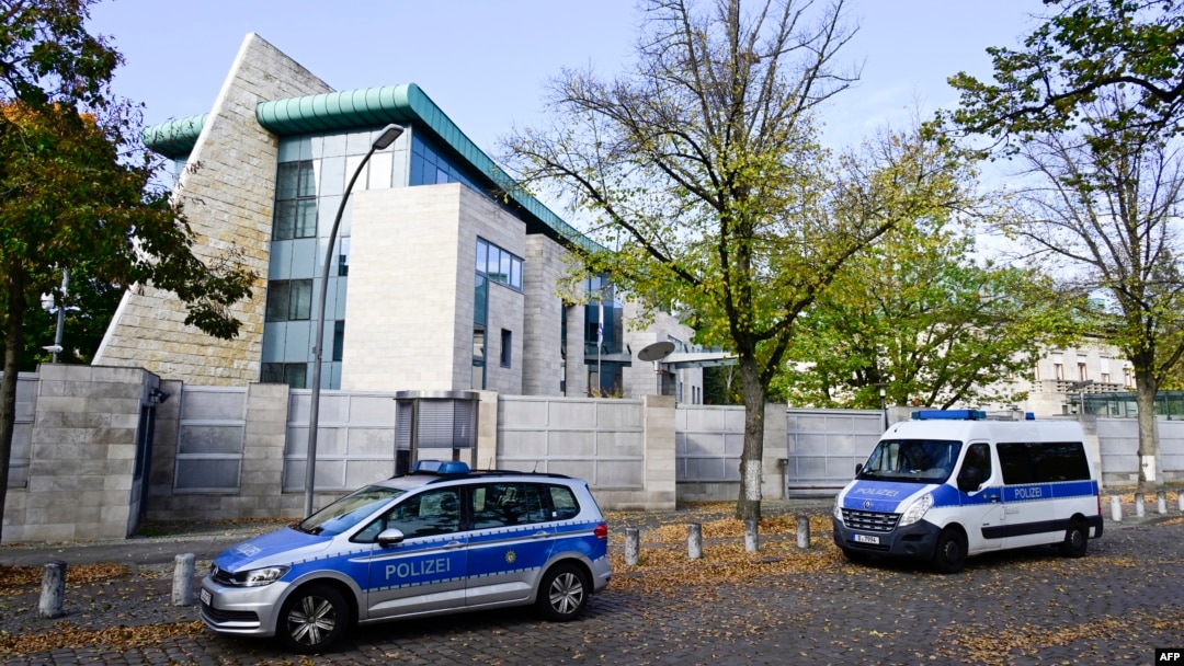 FILE - Police cars stand in front of the Israeli embassy in Berlin, on Oct. 20, 2024.