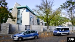 FILE - Police cars stand in front of the Israeli embassy in Berlin, on Oct. 20, 2024.