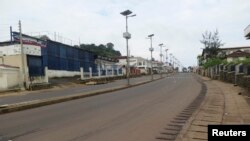 An empty street is seen at the start of a three-day national lockdown in Freetown, September 19, 2014.