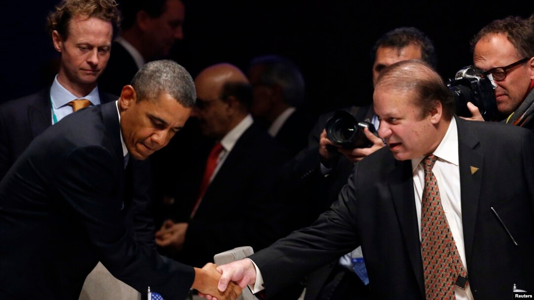 AQSh prezidenti Barak Obama Pokiston Bosh vaziri Navoz Sharif bilan yadroviy xavfsizlikka bag'ishlangan xalqaro anjumanda. Gaaga. 24-mart, 2014 