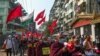 Myanmar Police Fire Warning Shots to Disperse Protesters