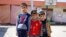 Displaced Iraqi boys pose at the Bilad al-Arab Elementary School, which has been turned into a housing complex for almost 31 families who fled Mosul because of Islamic State violence, in Baghdad, Oct. 22, 2014.
