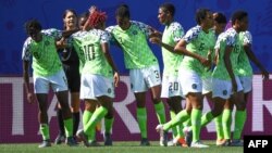 Les joueuses nigerianes célèbrent leur but contre la Corée du Sud, France, le 12 juin 2019.