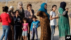 အီရတ်နိုင်ငံ Mosul မြို့ ရှိ Bardarash ဒုက္ခသည်စခန်းက စစ်ရှောင် ဒုက္ခသည် အမျိုးသမီးများ (အောက်တိုဘာ ၁၇၊ ၂၀၁၉)