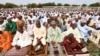 Nigeria Muslim men and boys, offer their prayers during Eid al-Fitr, at Ramat square in Maiduguri, Nigeria, Thursday, Aug. 8, 2013. Nigerians in the birthplace of an Islamic uprising gripping the northeast Thursday celebrated the Muslim holy day of Eid 