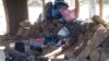 The settlers told Studio 7 that their homes were razed to the ground by police who were armed with shotguns, batons and dogs. In the picture a child sleeping in the open following the eviction of farm occupants targeted by the first family. (Courtesy Photo) 