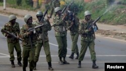 Anti-riot police fire shots into the air to disperse supporters of Kenyan opposition National Super Alliance (NASA) coalition in Nairobi, Nov. 17, 2017. 