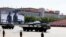 FILE - Military vehicles carry drones during a parade commemorating the 70th anniversary of Japan's surrender during World War II held in front of Tiananmen Gate in Beijing, Sept. 3, 2015.