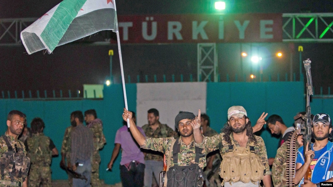 Pasukan Kurdi saat berhasil merebut kota Tal Abyad dari militan ISIS, 15 Juni lalu (foto: dok). ISIS dilaporkan menggempur kota Kobani yang dikuasai pasukan Kurdi.