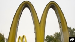 FILE - McDonald's golden arches are seen in Omaha, Nebraska, Oct. 21, 2011. 