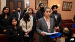 FILE - State Sen. Aisha Wahab listens to speakers during a news conference where she proposed SB 403, a bill that adds caste as a protected category in the state's anti-discrimination laws, on March 22, 2023, in Sacramento, California. 