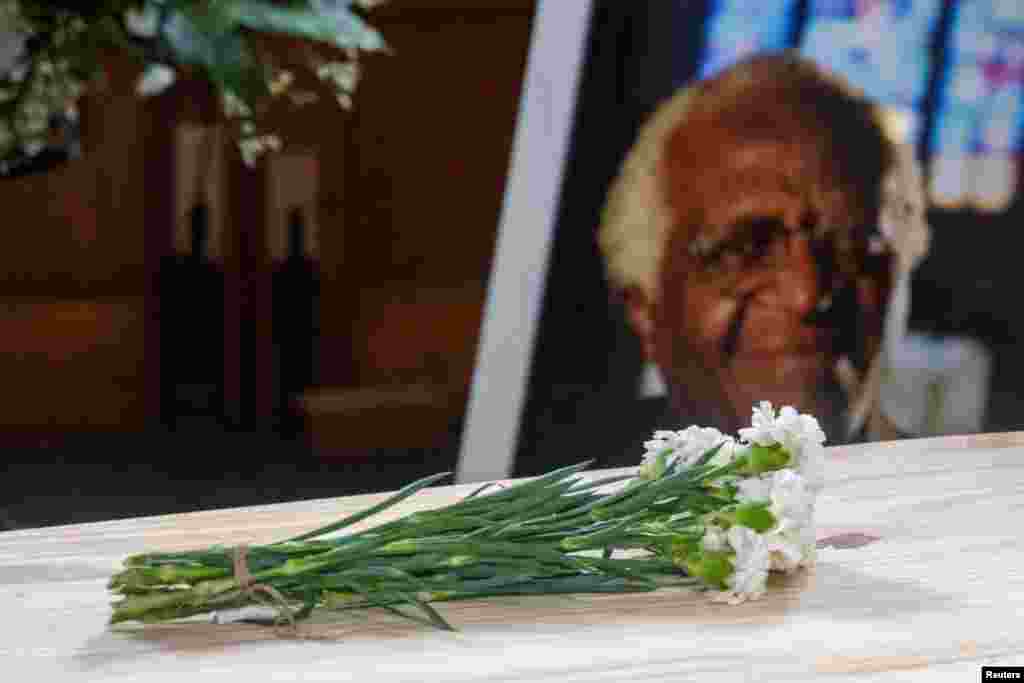 Flowers are laid over the coffin of the late Archbishop Desmond Tutu during the state funeral at St. George&#39;s Cathedral in Cape Town, South Africa, Jan. 1, 2022.