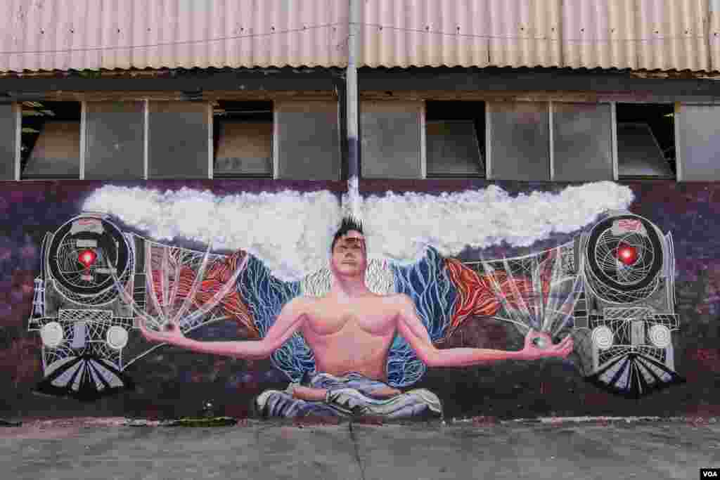 Graffiti is seen at the Rail Authority's Beirut headquarters in what used to be a train station. (Photo - J. Owens/VOA)