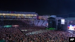 Fans fill the stadium as New Zealand band Six60 perform at Eden Park in Auckland, New Zealand,, April 24, 2021. Six60 is being billed as the biggest live act in the world since the coronavirus pandemic struck.