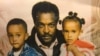 FILE - Dawit Isaak, an Eritrean-Swedish journalist and advocate for human rights, center, poses with his children, who include his daughter, Betlehem Isaak, right, who continues to fight for the release of her father, who has been imprisoned without trial in Eritrea since 2001.