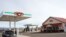 FILE - A gas station and convenience store in California.
