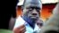 Ugandan opposition leader Kizza Besigye speaks to journalists in the yard outside his house shortly after returning home after a confrontation with police, in Kasangati, Uganda, May 19, 2011 (file photo)