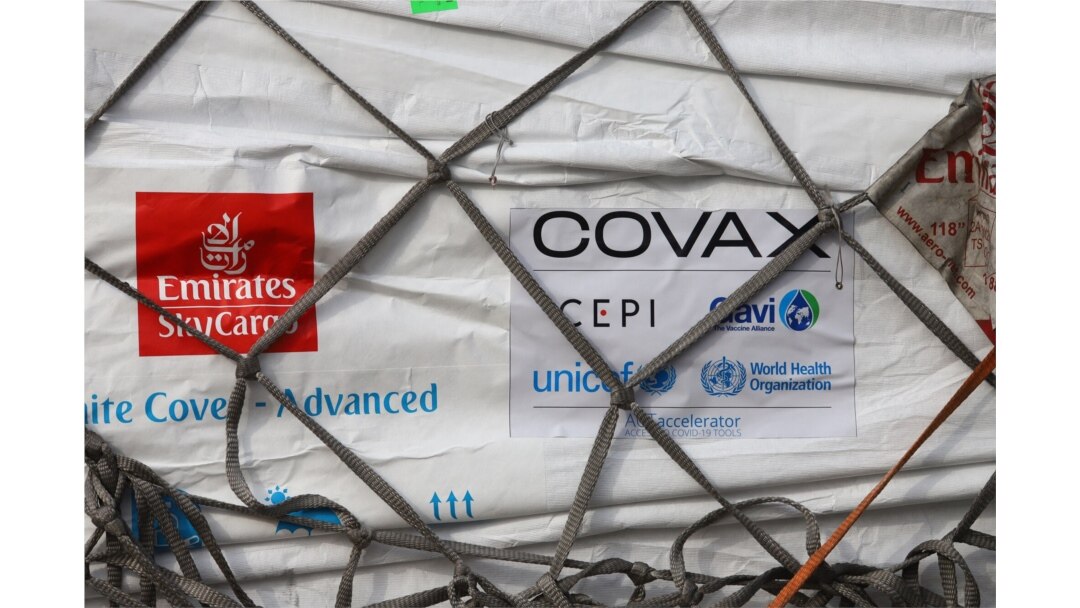 A shipment of COVID-19 vaccines from the COVAX global COVID-19 vaccination program arrives at the Kotoka International Airport in Accra, Ghana, Feb. 24, 2021.