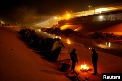 Venezuelan migrants at a camp on the banks of the Rio Bravo river in Ciudad Juarez