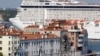 FILE - The MSC Musica cruise ship is seen in Venice lagoon June 17, 2012. Since the wreck of the Costa Concordia, environmentalists have stepped their efforts to have large cruise ships banned from the lagoon which surrounds the historic center of the canal city.