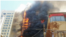 <div>آتش سوزی در خیابان امام رضا مشهد<br />
عکس: سعید گلی</div>

