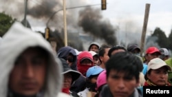 People block a road during protests after Ecuador's President Lenin Moreno's government ended four-decade-old fuel subsidies, in Cayambe, Ecuador, October 5, 2019. 