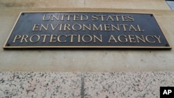 FILE - A marker on the outside of the Environmental Protection Agency building in Washington.