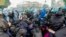 Italian police and demonstrators clash during a march in support of the Palestinian people in Rome, Oct. 5, 2024.