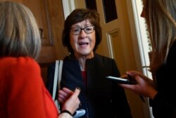 FILE - Sen. Susan Collins, R-Maine, talks to reporters on Capitol Hill in Washington, Jan. 15, 2020.