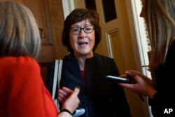 FILE - Sen. Susan Collins, R-Maine, talks to reporters on Capitol Hill in Washington, Jan. 15, 2020.