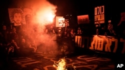 People in Tel Aviv, Israel, protest to demand the immediate release of hostages held by Hamas in the Gaza Strip, March 1, 2025.