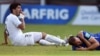 Uruguay's forward Luis Suarez (L) reacts past Italy's defender Giorgio Chiellini during a Group D football match between Italy and Uruguay at the Dunas Arena in Natal during the 2014 FIFA World Cup, June 24, 2014.