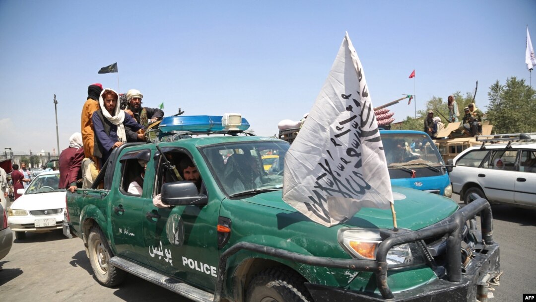 Taliban fighters patrol the streets of Kabul on August 16, 2021, after a stunningly swift end to Afghanistan's 20-year war.