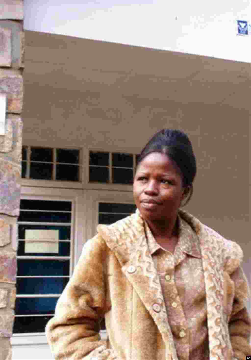 ** CORRECTS DAY IN DATE ** Cecile Mulolo a psychologist stands outside the Panzi General Hospital for rape victims in Eastern Congo close to the town of Bukavu, Democratic Republic of Congo on Saturday, June. 11, 2005. In Congo, for those who manage to su