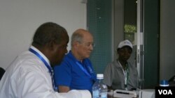 President Rupiah Banda withe Dr. John Stremlau, the vice president for peace programs at the Carter Center and Mercy Njoroge, national coordinator for the Carter Center's poll observer group.