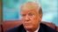 U.S. President Donald Trump listens to a question during an interview with Reuters in the Oval Office of the White House in Washington, Aug. 20, 2018. 