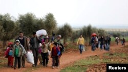 Rûniştvanên Efrînê jiber êrîşan cîh û warên xwe dihêlin (Arşîv)